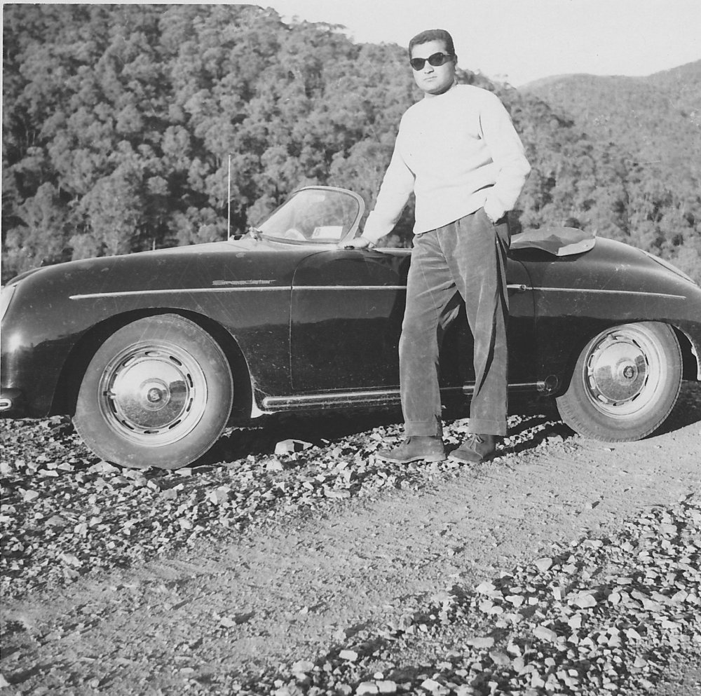 John with speedster and snowy mountains
